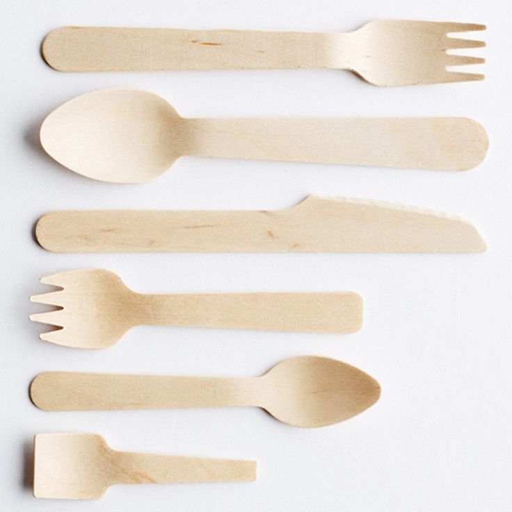 Eco-friendly wooden cutlery set with spoons, forks and knives